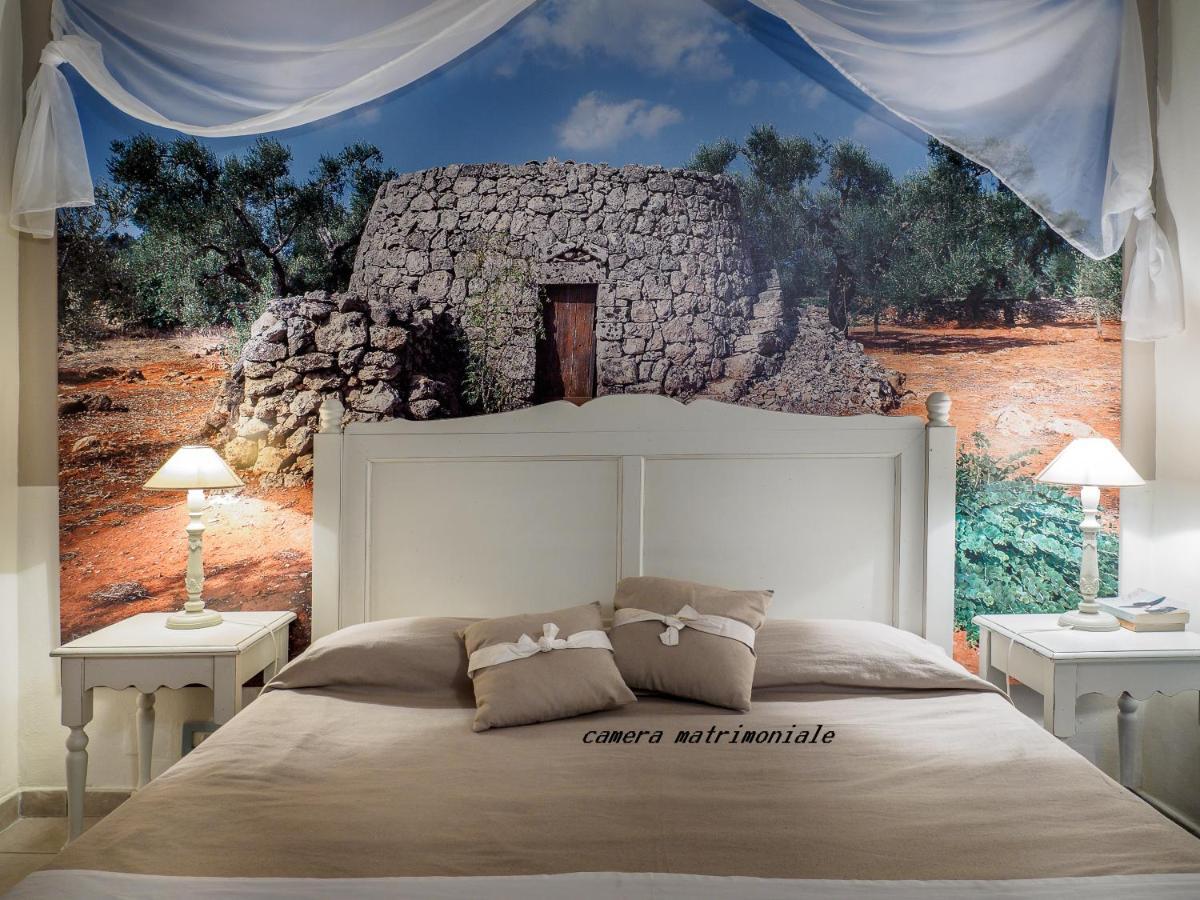 Antica Masseria Rottacapozza ตอร์เร ซาน จิโอวานนิ อูเจนโต ภายนอก รูปภาพ